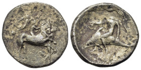 Italy. Calabria, Tarentum, c. 340-335 BC. AR Nomos (21,9mm, 7g). Nude youth on horse rearing right; to right, nude youth standing before the horse and...