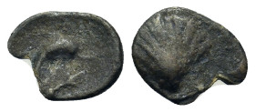 Italy. Southern Apulia, Tarentum, c. 325-280 BC. AR Litra (10,6mm, 0.5g). Scallop shell. R/ Dolphin r.; below, symbol. HNItaly 979.