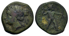 Italy. Bruttium. The Brettii, c. 214-211 BC. Æ (17,9mm, 3g). Diademed head of Nike left, behind, grain ear. R/ Zeus standing right, holding sceptre an...