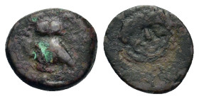 Sicily, Kamarina, c. 420-405 BC. Æ Onkia (11,4mm, 1.1g). Facing gorgoneion with protruding tongue. R/ Owl standing to left, head facing, grasping liza...