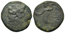 Sicily, Katane, c. 2nd century BC. Æ (22,4mm, 10.8g). Janiform head of Serapis; three monograms around. R/ Demeter standing l., holding grain ears and...