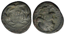 Sicily, Syracuse, Under Roman rule, late second century BC. Æ (16,7mm, 3.3g). Wreathed head of Kore to left. R/ Legend in three lines within grain wre...