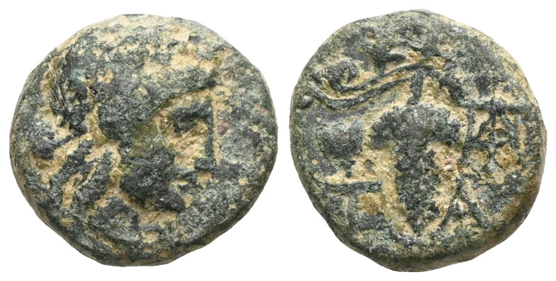 Greek Aeolis. Temnos circa 200 BC. Bronze Æ Head of Dionysos right, wearing ivy ...