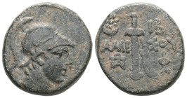 PONTOS, Amisos. Time of Mithradates VI Eupator. Circa 85-65 BC. Æ . Helmeted head of Ares(?) right / Sword in sheath; star in crescent to upper left, ...