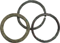 Celtic World. Multiple lot of three (3) 'proto money' bronze rings. Weights: from 88 to 45 g. Dimensions: from 73 to 72 mm. AE. Interesting group.
