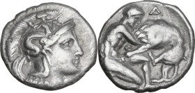 Greek Italy. Southern Apulia, Tarentum. AR Diobol, c. 325-280 BC. Obv. Head of Athena right, wearing helmet decorated with Scylla. Rev. Herakles kneel...