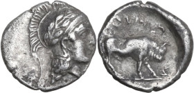 Greek Italy. Southern Lucania, Thurium. AR Triobol, 443-410 BC. Obv. Head of Athena right, wearing helmet decorated with wreath. Rev. Bull advancing r...