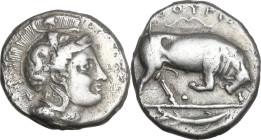 Greek Italy. Southern Lucania, Thurium. AR Didrachm, 350-300 BC. Obv. Head of Athena right, wearing helmet decorated with Scylla hurling rock. Rev. Bu...