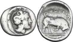 Greek Italy. Southern Lucania, Thurium. AR Triobol, 350-300 BC. Obv. Head of Athena right, wearing helmet decorated with wreath. Rev. ΘOYPIΩN. Bull bu...