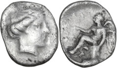 Greek Italy. Bruttium, Terina. AR Triobol, 400-356 BC. Obv. Head of nymph Terina right. Rev. Nike seated left on plinth, holding out right hand upon w...