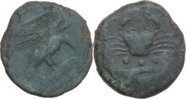 Sicily. Akragas. AE Tetras or Trionkion, c. 425-410 BC. Obv. Eagle standing right on hare, head lowered, wings spread. Rev. Crab; below, three pellets...