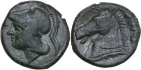Anonymous. AE Litra or quartuncia (?), Campanian mint, 280-270 BC. Obv. Helmeted head of Minerva, left. Rev. Horse's head, left, with bridle, on base....