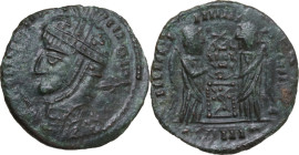 Uncertain Germanic tribe. Pseudo-Imperial coinage. AE, Barbaric imitation. Obv. Helmeted and cuirassed bust left, with shield and spear. Rev. Two Vict...