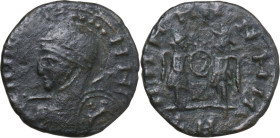 Uncertain Germanic tribe. Pseudo-Imperial coinage. AE, Barbaric imitation. Obv. Helmeted and cuirassed bust left, with shield and spear. Rev. Two Vict...