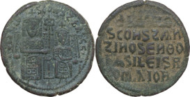 Basil I the Macedonian (867-886) with Constantine (868-879). AE Follis, Constantinople mint. Obv. Standing figures of Basil and Constantine facing, bo...