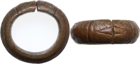 Africa. AE Proto-money bracelet, XIX-XX century. Dimensions: 72 x 66 mm. Cf. Fisher 1987, pp. 278-279. AE. 290.00 g. Fascinating engraved and punched ...