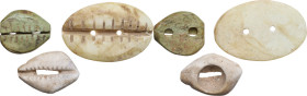 China. Lot of three (3) cowry currency; one made of stone, two of bone. Dimensions: 37, 25, 20 mm.