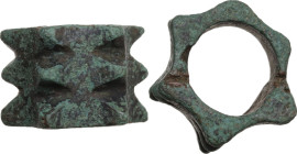 BRONZE 'PASSAREDINI' OR MACE HEAD Italic culture, c. 6th to 4th century BC. Masculine ring forged from leaded bronze. The circular accessory features ...