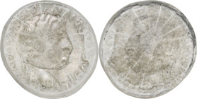 GLASS TOKEN Roman period (?), c. 1st century AD. Curious token obtained by pouring glass onto a refractory material on which the obverse of a denarius...