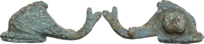 DOLPHIN SHAPED FIBULA Roman period, c. 2nd century AD. Bronze dolphin-shaped fib...