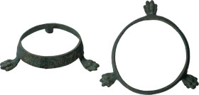 ROMAN BRONZE TRIPOD Roman period, c. 2nd-3rd century AD. Roman bronze tripod resting on three lion paws and composed of a high circular bronze band de...