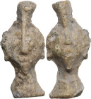 'GROMA' HEAD WEIGHT Roman period, 1st - 4th century AD. Weight in the shape of a janiform head with suspension loop. Dimensions: 33 x 14 mm. Weight: 2...