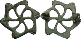 BRONZE OPENWORK FIBULA Roman period, c. 2nd - 4th century AD. Roman bronze fibula configured in a openwork hexahedron. Diameter: 29 mm. Rare and fasci...