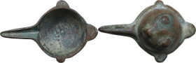 BRONZE ARAB-BYZANTINE ITEM Byzantine, c. 5th - 10th century AD. Arab-Byzantine oil lamp filler or cosmetic mortar with hemispherical body, deep rounde...