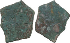 INSCRIBED FRAGMENT Byzantine (?), c. 6th - 10th century AD. Fragment of a bronze document bearing an inscription engraved in six lines on one side, wh...