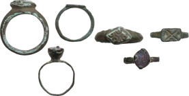 THREE ANCIENT RINGS Medieval period, c. 5th to 12th century AD. Lot of three medieval bronze rings with engraved geometric decorations. Inner sizes: 1...
