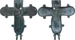ENKOLPION RELIQUARY CROSS Byzantine, c. 10th - 12th century AD. Byzantine bronze reliquary cross valve. Very schematic engraved and relief decoration,...