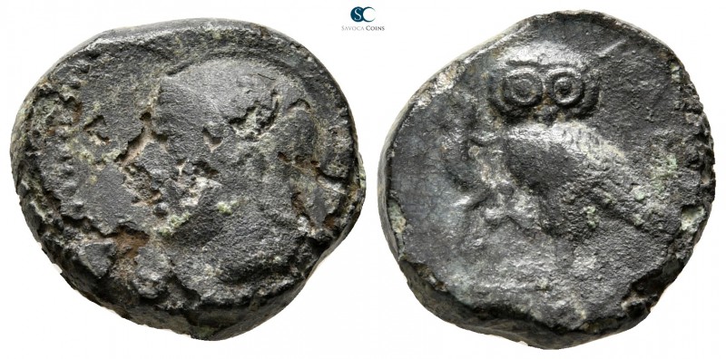 Sicily. Kamarina circa 420-405 BC. 
Tetras or Trionkion Æ

13 mm., 3,08 g.
...