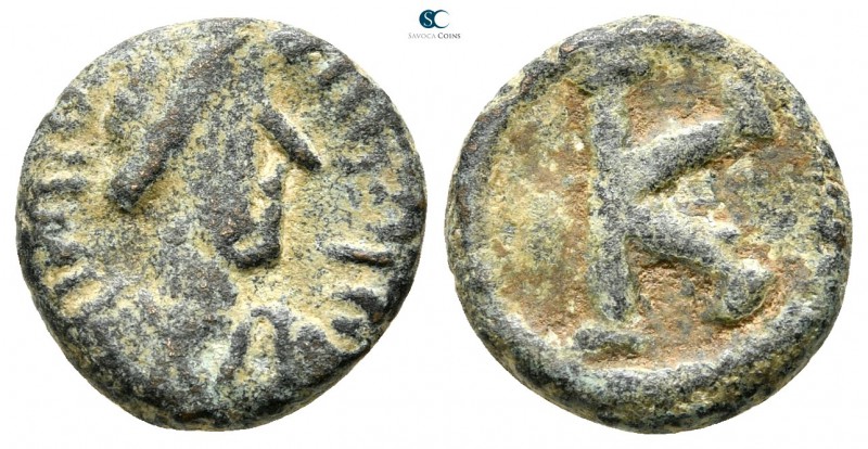 Justinian I AD 527-565. Salona(?)
Half follis Æ

14 mm., 2,30 g.



nearl...