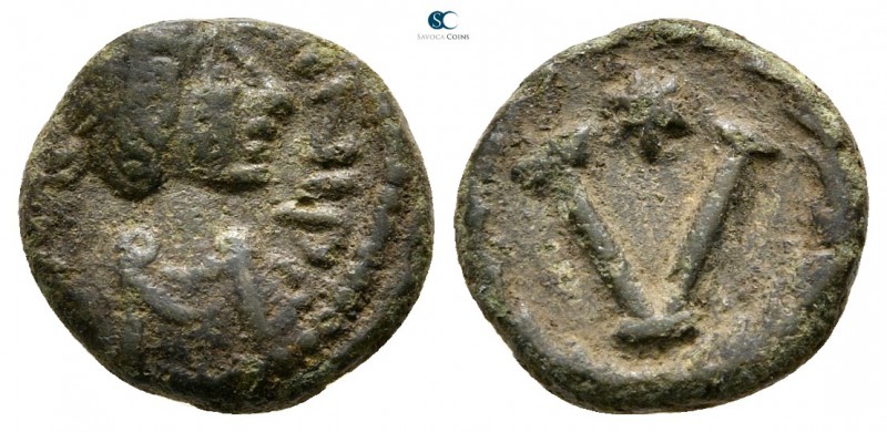 Justin II AD 565-578. Rome
Pentanummium Æ

11 mm., 1,45 g.



very fine