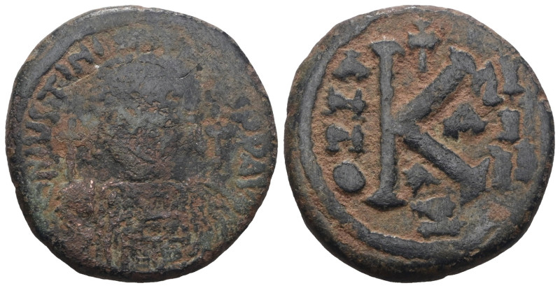 Justinian I. (527-565 AD). 1/2 Follis. Constantinople. Obv: diademed bust of Jus...