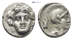 Pisidia. Selge circa 350-300 BC. Obol AR (0.9 Gr. 10mm.) 
Gorgoneion. 
Rev. Head of Athena to right, wearing crested Attic helmet; behind, astragalos.