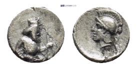 Persia. Achaemenid Empire. Uncertain mint in Cilicia circa 400 BC. Tetartemorion AR (5mm, 0,14 g) Persian king or hero in kneeling-running stance righ...