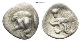 MYSIA. Kyzikos. Hemiobol (450-400 BC). (0.32 Gr. 9mm.)
Forepart of boar left; tunny to right; retrograde K on shoulder.
 Rev. Head of roaring lion lef...