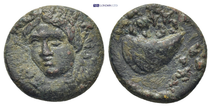 AEOLIS, Gryneion. 4th century BC. Æ (17mm, 3.8 g,). Laureate head of Apollo faci...