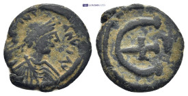 Justinian I. 527-565. Æ Pentanummium (15mm, 1.8 g). Antioch mint. Struck 542-546. Diademed and draped bust right / Large E with cross, A to right.