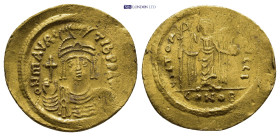 Mauricius Tiberius, 582-602. Solidus (22mm, 4.4 g) 582/583, Constantinopolis. Officina I. Helmeted, draped and cuirassed bust facing, holding globus c...