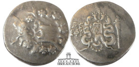 IONIA, Ephesos. 133-67 AD. AR Cistophoric Tetradrachm. Dated year 66=69-68 BC. Cista mystica with serpent; all within ivy wreath / Bow-case with serpe...