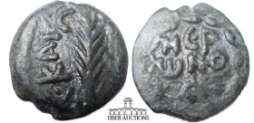 JUDAEA, Procurators. Porcius Festus. 59-62 CE. Æ Prutah. Jerusalem mint. Legend within wreath / Palm branch. 16 mm, 1.58 g.