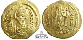 Phocas. 602-610. AV Solidus. Constantinople mint, 10th officina. Struck 607-609. Crowned and draped bust facing, holding globus cruciger / Angel stand...