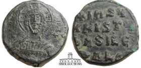 Class A1 Anonymous Æ Follis attributed to John I Tzimiskes. AD 969-976. Bust of Christ facing, wearing halo with cross, two pellets on each of the lim...