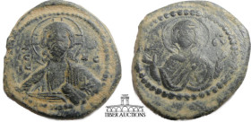 Class G Anonymous Æ Follis attributed to Romanus IV. 1068-1071. IC XC to left and right of bust of Christ, nimbate, facing, right hand raised, scroll ...