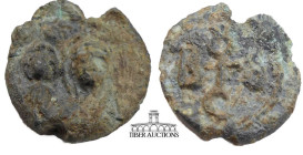 Byzantine. Lead seal. Royal figures with cross. 6th Century-11th Century CE. 14 mm x 12 mm. 11.94 g.