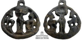 Luristan. Bronze Pendent. 3rd - 2nd century BC. Large round pendent depicting an Ibex ram facing forward with two other rams on either side. With inta...