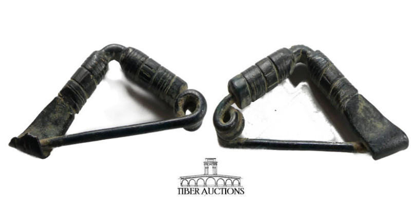 Roman. Bronze Fibula. AD 100-300. Interesting design with rare intact and workin...