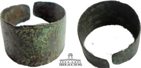 Roman. Engraved Bronze Hair Band. 1st - 5th century AD. Hairband engraved with stars and geometric designs. 32 mm x 32 mm, 11.53 g.